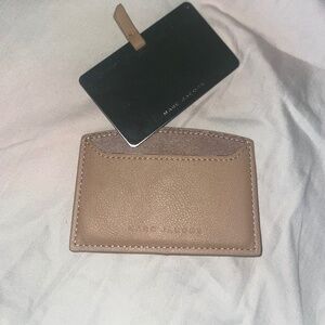 Marc Jacobs Mirror with Leather Holder and a YSL Pocketbook